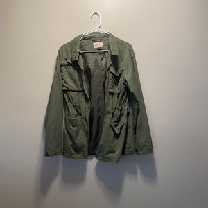 Green zip up jacket